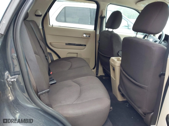 2008 Mazda Tribute Touring with VIN 4F2CZ02ZX8KM25983, listed as a IAAI auction lot 42122836 with 148,080 mi miles. Bid and sale history available at carsss.com. Image 8.