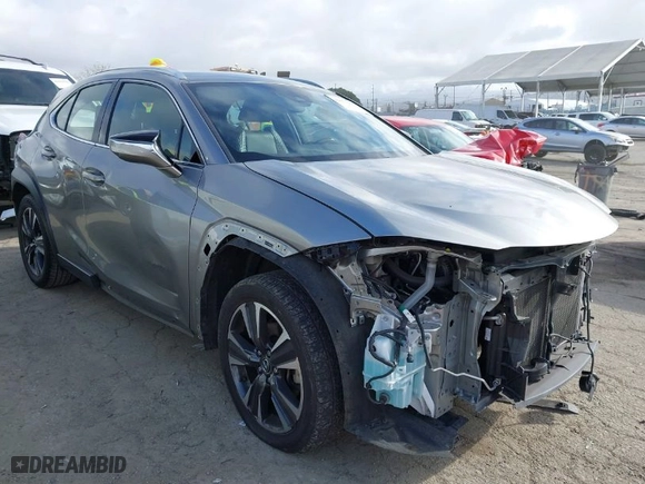 2021 Lexus UX with VIN JTHX3JBH4M2043263, listed as a IAAI auction lot 41671055 with 100,589 mi miles. Bid and sale history available at carsss.com. Image 1.