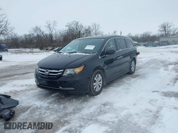 2015 Honda Odyssey EX-L with VIN 5FNRL5H60FB018030, listed as a IAAI auction lot 41608357 with 166,214 mi miles and . Bid and sale history available at carsss.com. Image 19.