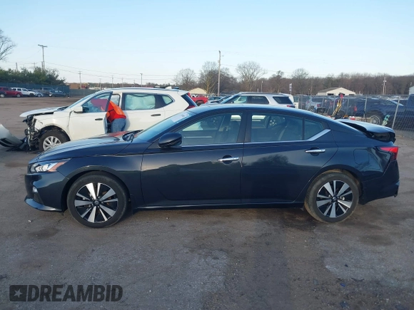 2021 Nissan Altima SV with VIN 1N4BL4DV5MN410885, listed as a IAAI auction lot 41809083 with 61,362 mi miles and . Bid and sale history available at DreamBid. Image 14.