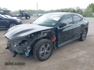 2021 Ford Mustang Mach-E Select with VIN 3FMTK1SS4MMA21329, listed as a IAAI auction lot 42241810 with 35,700 mi miles and . Bid and sale history available at DreamBid. Image 2.