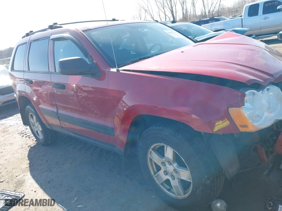 2005 Jeep Grand Cherokee Laredo with VIN 1J4GR48K55C651268, listed as a IAAI auction lot 41987117 with 189,974 mi miles. Bid and sale history available at carsss.com. Image 14.