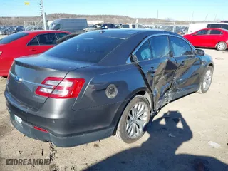 2015 Ford Taurus Limited with VIN 1FAHP2F89FG168636, listed as a IAAI auction lot 41729615 with 126,605 mi miles. Bid and sale history available at carsss.com. Image 4.