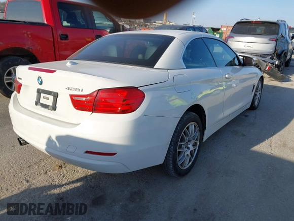 2015 BMW 4 Series 428i xDrive with VIN WBA3T1C51FP821140, listed as a IAAI auction lot 41802697 with 95,232 mi miles and . Bid and sale history available at carsss.com. Image 4.