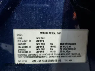 2024 Tesla Model Y z VIN 7SAYGDED9RF005104, wystawiony jako Copart lot #64974545 z przebiegiem 20 422 mil mil oraz Szkoda całkowita • Salvage title. Historia ofert i sprzedaży dostępna na DreamBid. Obrazek 13.