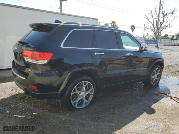 2019 Jeep Grand Cherokee Overland with VIN 1C4RJECG5KC602873, listed as a Copart auction lot 46701925 with 96,444 mi miles and Salvage Title. Bid and sale history available at carsss.com. Image 3.
