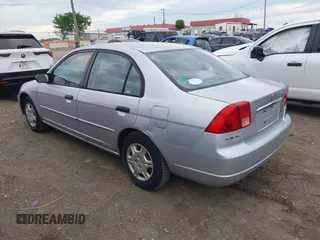 2001 Honda Civic LX with VIN 1HGES16541L049356, listed as a IAAI auction lot 42166564 with 207,913 mi miles. Bid and sale history available at carsss.com. Image 3.