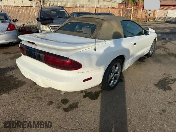 1997 Pontiac Firebird Firebird with VIN 2G2FS32K3V2232171, listed as a Copart auction lot 46740375 with 64,745 mi miles and Salvage title. Bid and sale history available at DreamBid. Image 4.