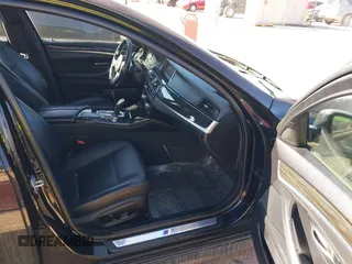 2016 BMW 5 Series 528i xDrive with VIN WBA5A7C56GG145318, listed as a IAAI auction lot 41414556 with 122,879 mi miles. Bid and sale history available at carsss.com. Image 5.