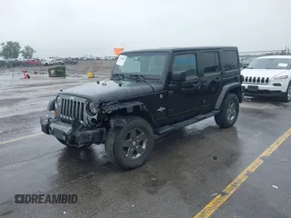 2013 Jeep Wrangler Unlimited Sport z VIN 1C4BJWDGXDL596450, wystawiony jako IAAI lot #42323862 z przebiegiem 114 105 mil mil oraz . Historia ofert i sprzedaży dostępna na DreamBid. Obrazek 2.