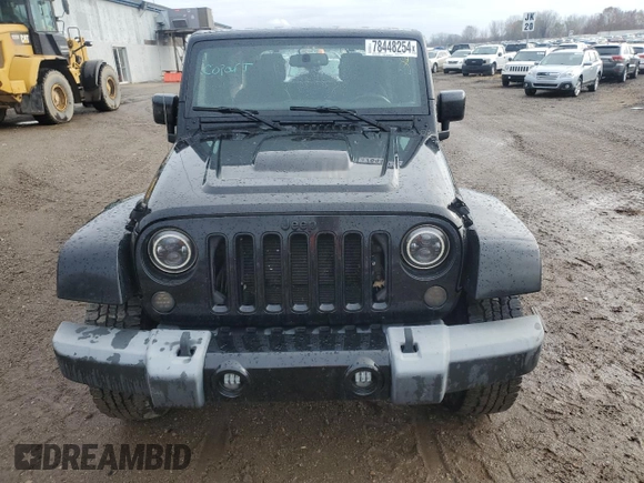 2015 Jeep Wrangler Unlimited Altitude with VIN 1C4HJWEG1FL703736, listed as a Copart auction lot 78448254 with 148,264 mi miles and Clean title. Bid and sale history available at DreamBid. Image 5.