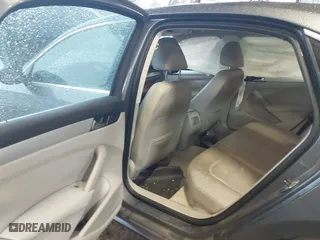 2012 Volkswagen Passat SE w/Sunroof with VIN 1VWBH7A38CC053564, listed as a IAAI auction lot 41488237 with 188,636 mi miles. Bid and sale history available at carsss.com. Image 8.