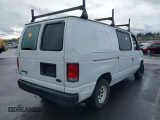 1998 Ford Econoline Cargo with VIN 1FTRE146XWHA45793, listed as a IAAI auction lot 41921474 with 168,307 mi miles and . Bid and sale history available at DreamBid. Image 4.