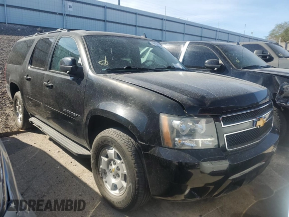 2014 Chevrolet Suburban LT with VIN 1GNSKJE71ER227075, listed as a Copart auction lot 76675654 with 214,113 mi miles and Salvage Title. Bid and sale history available at DreamBid. Image 4.