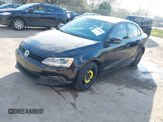 2014 Volkswagen Jetta Sedan SE w/Connectivity with VIN 3VWD07AJ5EM238638, listed as a IAAI auction lot 41518500 with 211,243 mi miles. Bid and sale history available at carsss.com. Image 2.