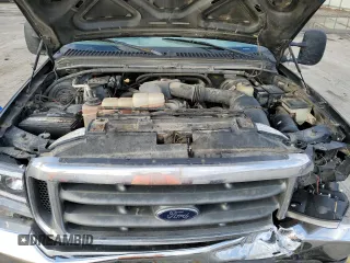 2000 Ford F-250 with VIN 1FTNF21S9YEA14056, listed as a Copart auction lot 80151994 with 165,477 mi miles and Salvage title. Bid and sale history available at DreamBid. Image 11.