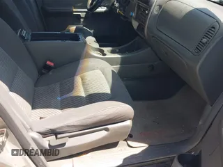 2005 Ford Explorer Sport Trac XLS z VIN 1FMZU67KX5UA59400, wystawiony jako IAAI lot #42051254 z przebiegiem 208 576 mil mil oraz . Historia ofert i sprzedaży dostępna na DreamBid. Obrazek 5.
