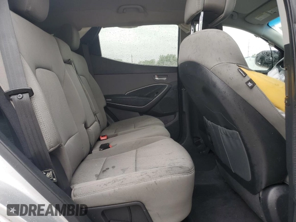 2017 Hyundai Santa Fe 2.4L z VIN 5XYZUDLB8HG500297, wystawiony jako Copart lot #58005165 z przebiegiem 91 871 mil mil oraz Szkoda całkowita • Salvage title. Historia ofert i sprzedaży dostępna na DreamBid. Obrazek 11.