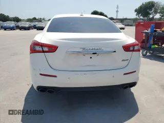 2019 Maserati Ghibli z VIN ZAM57XSA6K1319461, wystawiony jako Copart lot #57321665 z przebiegiem Nie podano mil oraz Tytuł czysty. Historia ofert i sprzedaży dostępna na DreamBid. Obrazek 6.