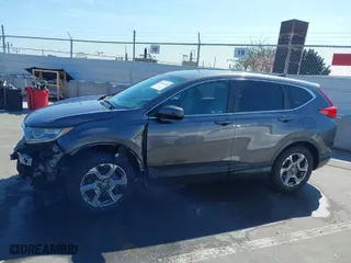 2019 Honda CR-V EX with VIN 5J6RW1H5XKA025281, listed as a IAAI auction lot 41874250 with 35,697 mi miles. Bid and sale history available at carsss.com. Image 15.