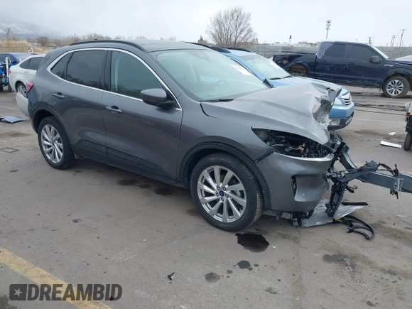 2021 Ford Escape Titanium with VIN 1FMCU9J92MUA27097, listed as a IAAI auction lot 41542774 with 14,822 mi miles and . Bid and sale history available at carsss.com. Image 1.