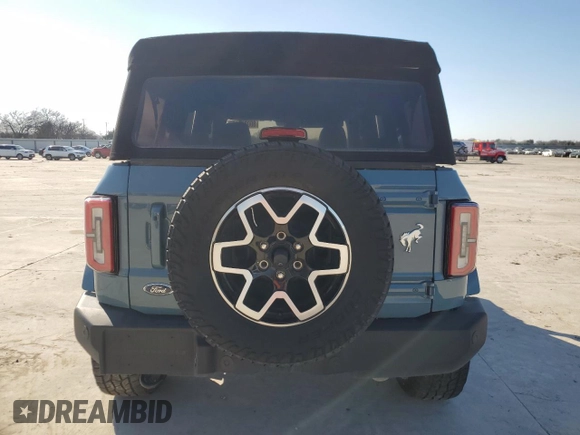 2022 Ford Bronco z VIN 1FMDE5DH6NLB13372, wystawiony jako Copart lot #80020714 z przebiegiem 19 783 mil mil oraz Szkoda całkowita • Salvage title. Historia ofert i sprzedaży dostępna na DreamBid. Obrazek 6.