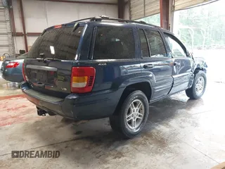 2000 Jeep Grand Cherokee Limited with VIN 1J4GW58N1YC264567, listed as a IAAI auction lot 42215459 with 170,874 mi miles and . Bid and sale history available at DreamBid. Image 4.