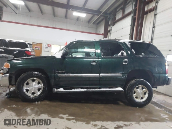 2004 GMC Yukon SLT with VIN 1GKEK13ZX4R198169, listed as a IAAI auction lot 41577015 with 169,562 mi miles. Bid and sale history available at carsss.com. Image 14.