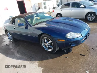 1997 Jaguar XK with VIN SAJGX2744VC016675, listed as a IAAI auction lot 41445909 with Not Provided miles and . Bid and sale history available at DreamBid. Image 1.