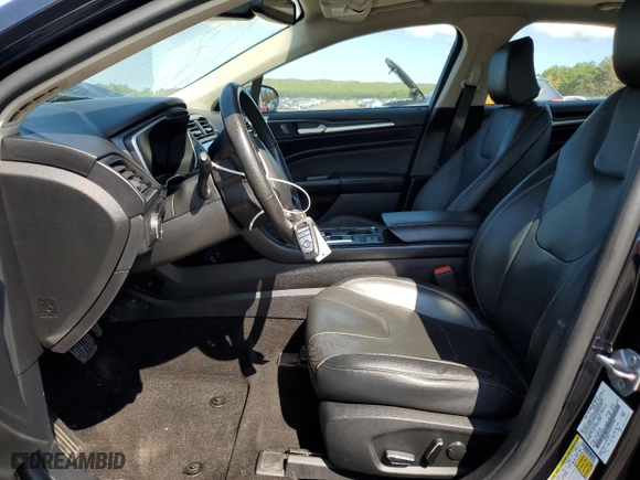 2020 Ford Fusion Plug-In Hybrid Titanium with VIN 3FA6P0SUXLR101997, listed as a Copart auction lot 69575324 with 74,121 mi miles and Salvage Title. Bid and sale history available at carsss.com. Image 7.