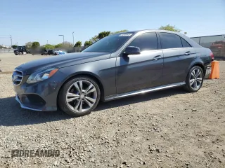 2015 Mercedes-Benz E 350 Sport with VIN WDDHF5KB9FB088305, listed as a Copart auction lot 54849945 with 124,315 mi miles and Salvage title. Bid and sale history available at DreamBid. Image 1.