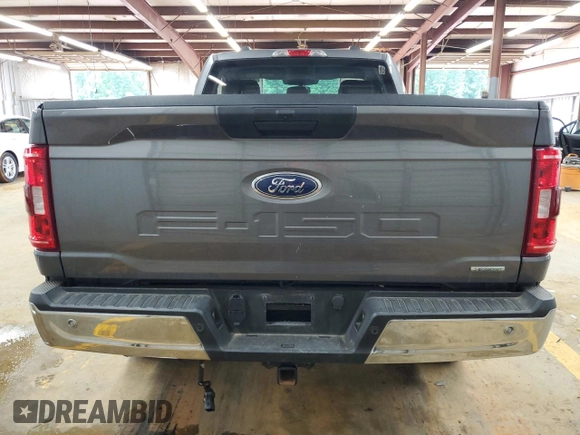 2021 Ford F-150 XL with VIN 1FTMF1EP7MKE58611, listed as a Copart auction lot 56912955 with 30,850 mi miles and Salvage title. Bid and sale history available at DreamBid. Image 6.