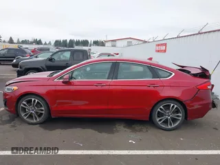 2019 Ford Fusion Titanium with VIN 3FA6P0K98KR179513, listed as a IAAI auction lot 41820059 with 112,155 mi miles. Bid and sale history available at carsss.com. Image 14.