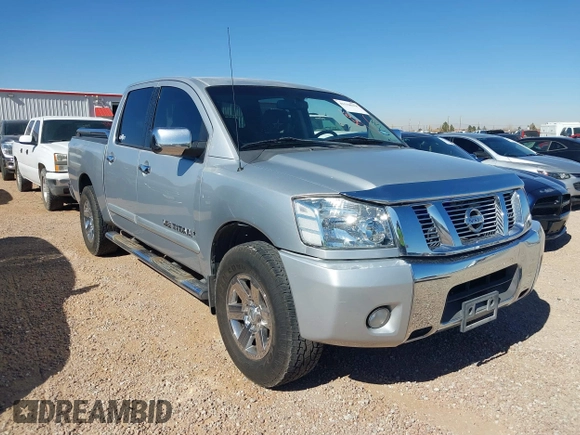 2011 Nissan Titan SV with VIN 1N6BA0ED7BN318878, listed as a IAAI auction lot 41518618 with 169,890 mi miles and . Bid and sale history available at DreamBid. Image 13.