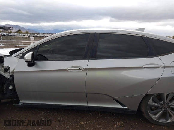 2019 Honda Clarity z VIN JHMZC5F17KC000007, wystawiony jako IAAI lot #41722099 z przebiegiem Nie podano mil oraz . Historia ofert i sprzedaży dostępna na DreamBid. Obrazek 13.