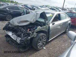 2021 Lexus ES 250 z VIN 58AD11D11MU002155, wystawiony jako IAAI lot #42186499 z przebiegiem 49 539 mil mil oraz . Historia ofert i sprzedaży dostępna na DreamBid. Obrazek 16.