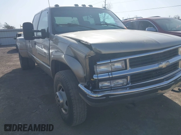 2000 Chevrolet Silverado 3500 z VIN 1GCHK33J0YF437640, wystawiony jako IAAI lot #41796214 z przebiegiem 139 411 mil mil oraz . Historia ofert i sprzedaży dostępna na DreamBid. Obrazek 6.