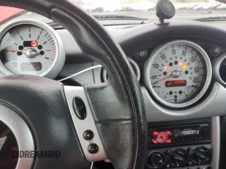 2003 MINI Hardtop z VIN WMWRC33413TC45360, wystawiony jako Copart lot #82666434 z przebiegiem 123 226 mil mil oraz Szkoda całkowita • Salvage title. Historia ofert i sprzedaży dostępna na DreamBid. Obrazek 9.