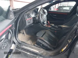 2015 BMW 4 Series 428i xDrive with VIN WBA4C9C57FD331872, listed as a IAAI auction lot 42276675 with 106,543 mi miles and . Bid and sale history available at DreamBid. Image 5.