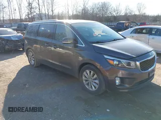 2016 Kia Sedona EX with VIN KNDMC5C14G6108235, listed as a IAAI auction lot 41497169 with 105,218 mi miles. Bid and sale history available at carsss.com. Image 1.