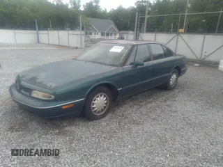 1998 Oldsmobile 88 LS z VIN 1G3HN52K5W4849011, wystawiony jako IAAI lot #42153650 z przebiegiem 171 969 mil mil oraz . Historia ofert i sprzedaży dostępna na DreamBid. Obrazek 2.