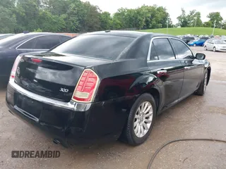 2013 Chrysler 300 with VIN 2C3CCAAG4DH557991, listed as a IAAI auction lot 42398680 with 178,150 mi miles and . Bid and sale history available at DreamBid. Image 4.