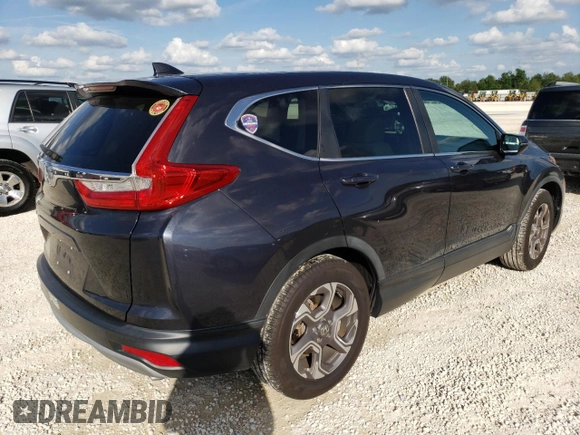 2018 Honda CR-V EX with VIN 7FARW1H57JE029448, listed as a Copart auction lot 70052882 with 57,388 mi miles. Bid and sale history available at carsss.com. Image 3.