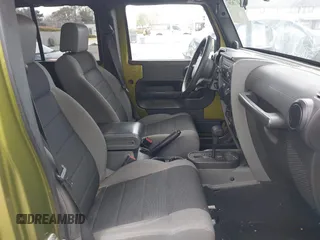 2007 Jeep Wrangler Unlimited X with VIN 1J8GB39107L114510, listed as a IAAI auction lot 41736367 with 467,567 mi miles and . Bid and sale history available at DreamBid. Image 5.