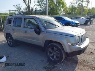 2014 Jeep Patriot High Altitude z VIN 1C4NJPFAXED854361, wystawiony jako IAAI lot #41835367 z przebiegiem 73 027 mil mil oraz . Historia ofert i sprzedaży dostępna na DreamBid. Obrazek 1.