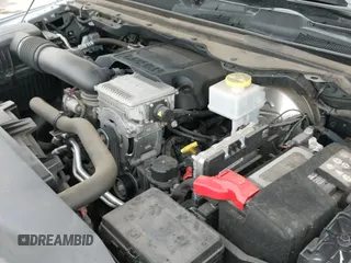 2021 Ram 1500 Big Horn z VIN 1C6SRFFT3MN796441, wystawiony jako IAAI lot #41318474 z przebiegiem 49 523 mil mil oraz . Historia ofert i sprzedaży dostępna na DreamBid. Obrazek 19.