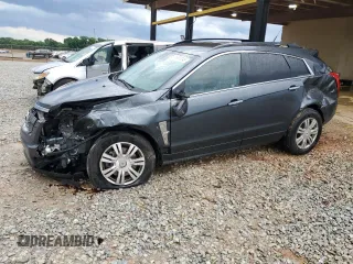 2011 Cadillac SRX z VIN 3GYFNGEY9BS544599, wystawiony jako Copart lot #55663245 z przebiegiem 142 678 mil mil oraz Szkoda całkowita • Salvage title. Historia ofert i sprzedaży dostępna na DreamBid. Obrazek 1.