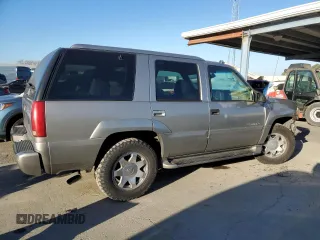2000 Cadillac Escalade z VIN 1GYEK13R5YR107157, wystawiony jako Copart lot #89024795 z przebiegiem 172 599 mil mil oraz Szkody całkowita. Historia ofert i sprzedaży dostępna na DreamBid. Obrazek 3.