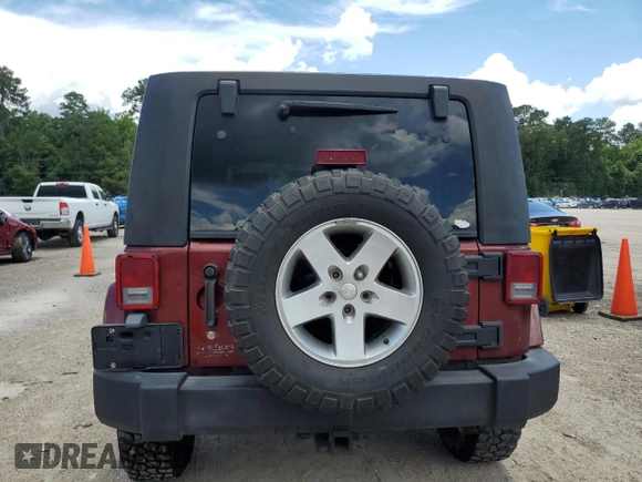 2007 Jeep Wrangler Unlimited Sahara with VIN 1J4GA591X7L118192, listed as a Copart auction lot 62357885 with 261,019 mi miles and Clean title. Bid and sale history available at DreamBid. Image 6.