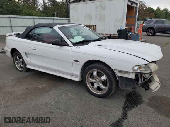1996 Ford Mustang GT with VIN 1FALP45X9TF225224, listed as a Copart auction lot 66895564 with 113,282 mi miles and Salvage Title. Bid and sale history available at carsss.com. Image 4.